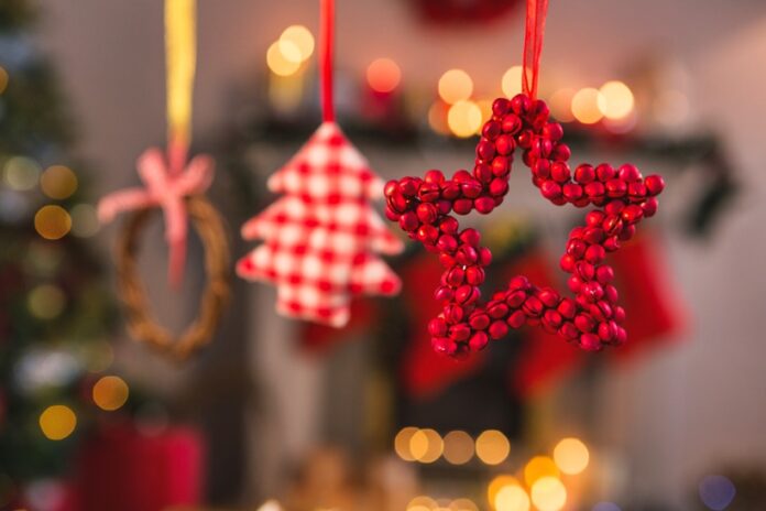 Christmas ornaments hanging on ribbon