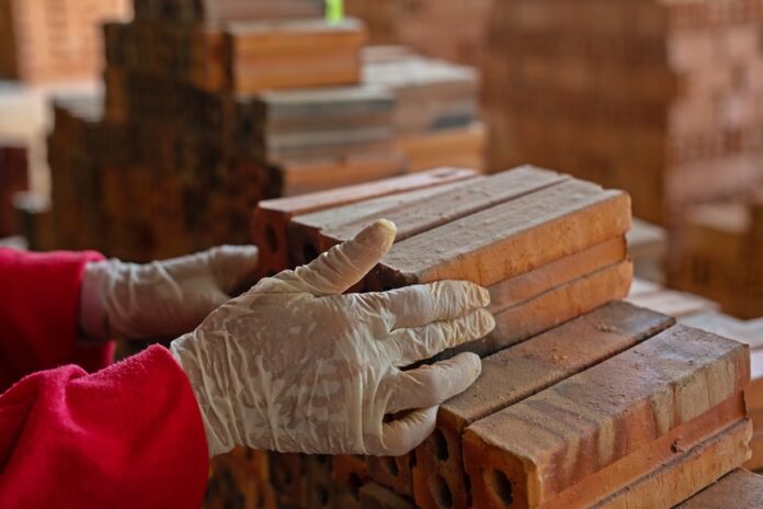 Brick piles placed on the factory floor.
